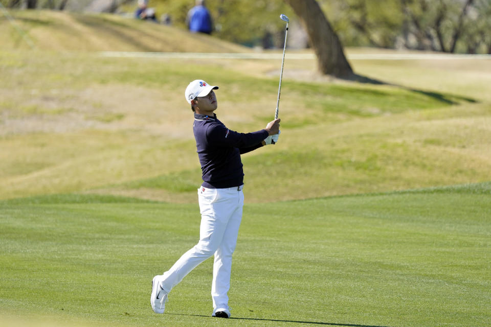 Si Woo Kim hits from the first fairway during the final round of The American Express golf tournament on the Pete Dye Stadium Course at PGA West Sunday, Jan. 24, 2021, in La Quinta, Calif. (AP Photo/Marcio Jose Sanchez)