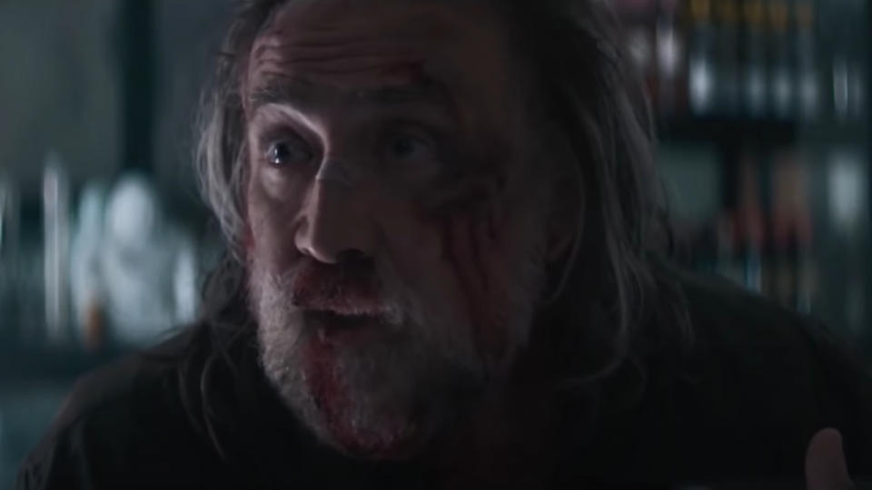 Nicholas Cage in conversation bloodied up in Pig.