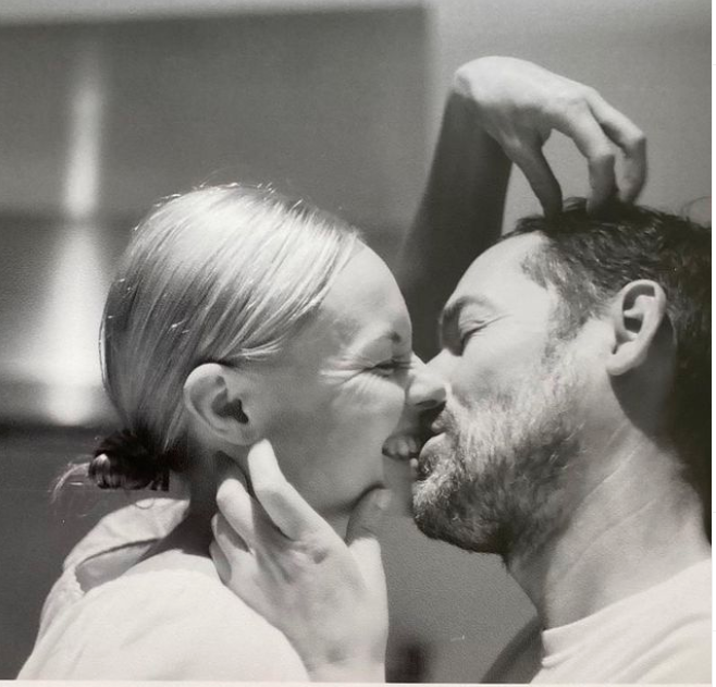 Kate Bosworth and Michael Polish kissing in split post