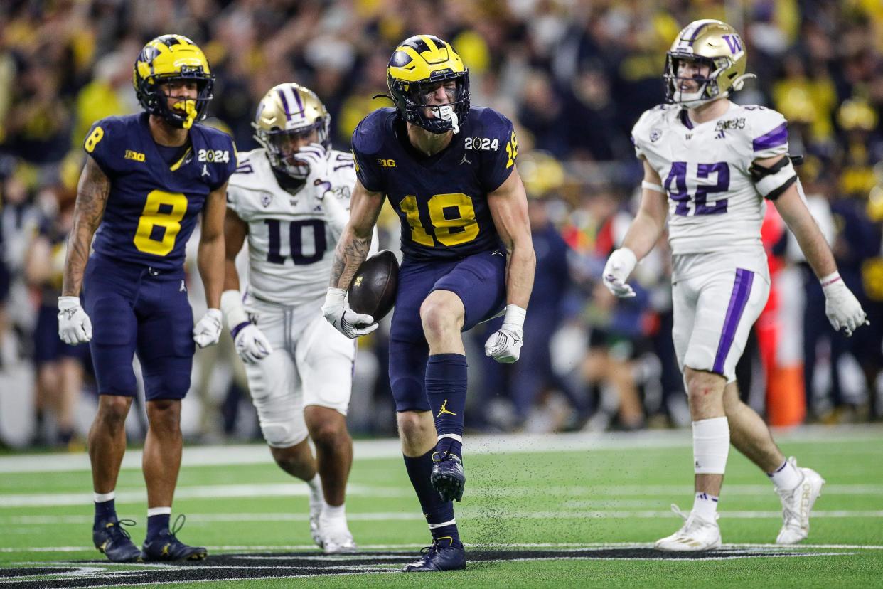 Michigan tight end Colston Loveland celebrates a play against Washington during the second half of U-M's 34-13 win in the College Football Playoff national championship game in Houston on Monday, Jan. 8, 2024.