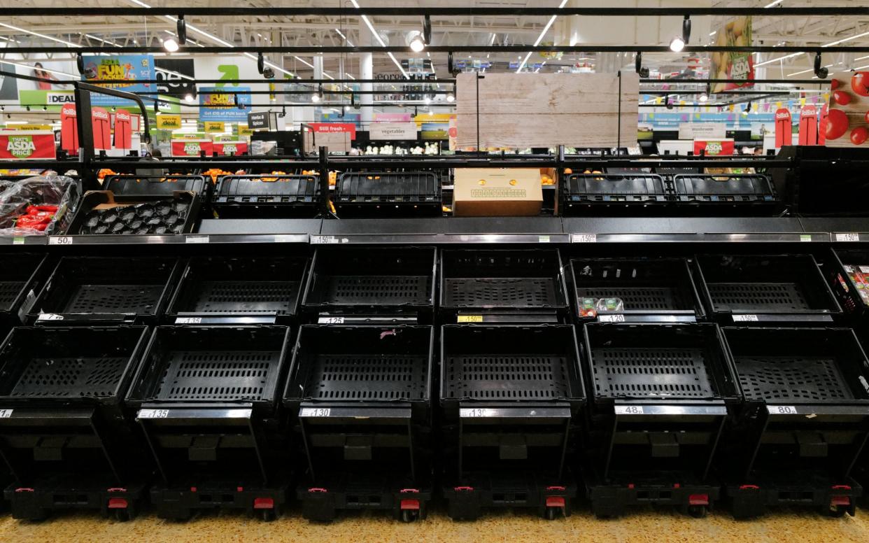 Many supermarket shelves were left empty as the pingdemic means that thousands of workers are in self-isolation - Matthew Horwood/Getty Images