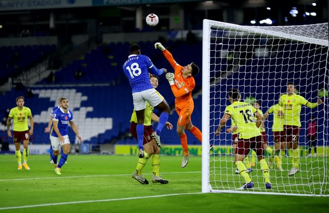 Nick Pope, centre, denied Danny Welbeck