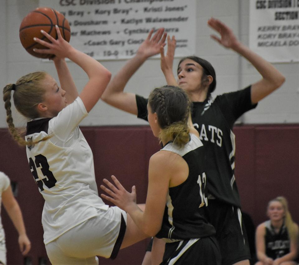 Frankfort-Schuyler Maroon Knight Madison Kelly (23) puts up a shot against the Adirondack Wildcats during the first half of Thursday's game.