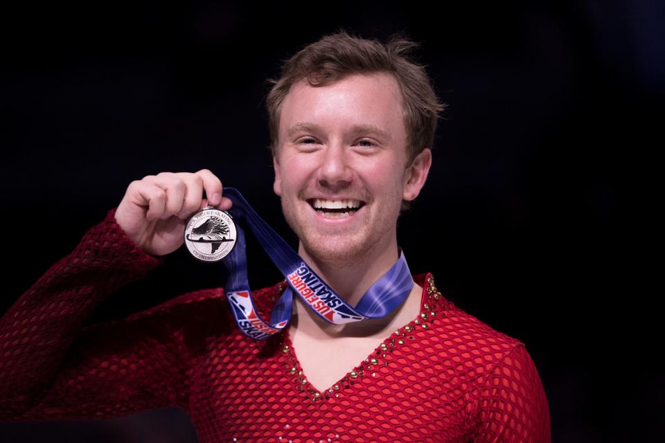 Ross Miner poses with his silver medal after the men's free skate program during the 2018 U.S. Figure Skating Championships.