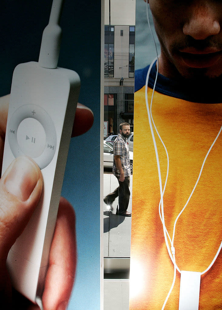 An iPod hanging from someone's neck