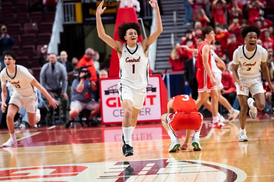 Central York's Ben Natal (1) reacts with his teammates as the final buzzer sounds in the PIAA Class 6A Boys Basketball Championship against Parkland at the Giant Center on March 23, 2024, in Hershey. The Panthers won, 53-51, to capture their first title in program history.