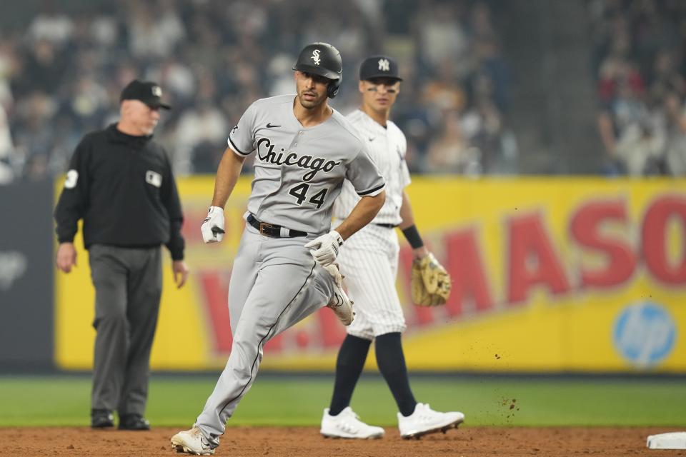 Chicago White Sox's Seby Zavala (44) passes New York Yankees' Anthony Volpe as he runs the bases after hitting a home run during the third inning of a baseball game Tuesday, June 6, 2023, in New York. (AP Photo/Frank Franklin II)