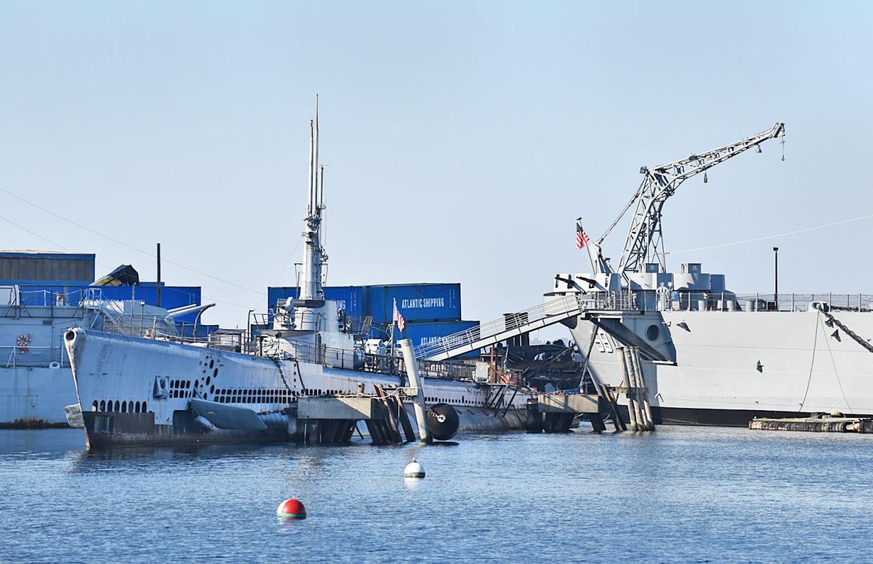 The submarine Lionfish sits alongside the Battleship Massachusetts at Battleship Cove in Fall River. Until recently, the German corvette Hiddensee was anchored between them. That ship has been scrapped.