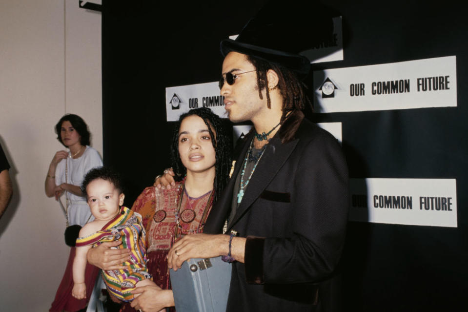 American actress Lisa Bonet (Lilakoi Moon), holding her daughter, Zoe Kravitz, and her husband, American singer-songwriter and musician Lenny Kravitz