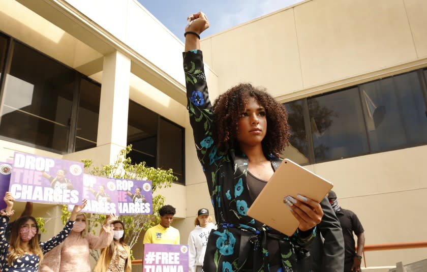 SAN LUIS OBISPO, CA - AUGUST 25: 20-year-old activist Tianna Arata addresses a rally Tuesday on the steps of the San Luis Obispo County Courthouse as supporters rally to protest her arrest following an anti-racism protest that allegedly ended in car vandalism on July 21, 2020 in San Luis Obispo that has sparked a national outcry. Arata was arrested on multiple felony accounts, but was subsequently released later that evening. The district attorney's office is currently reviewing Arata's case to determine what her charges will be. Her arraignment is set for Sept. 3. Today's rally was hosted by the Free Tianna Coalition, which is backed by BLM co-founder Patrisse Cullors. Courthouse on Tuesday, Aug. 25, 2020 in San Luis Obispo, CA. (Al Seib / Los Angeles Times