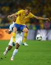 KIEV, UKRAINE - JUNE 19: Florent Malouda of France challenges Sebastian Larsson of Sweden during the UEFA EURO 2012 group D match between Sweden and France at The Olympic Stadium on June 19, 2012 in Kiev, Ukraine. (Photo by Lars Baron/Getty Images)