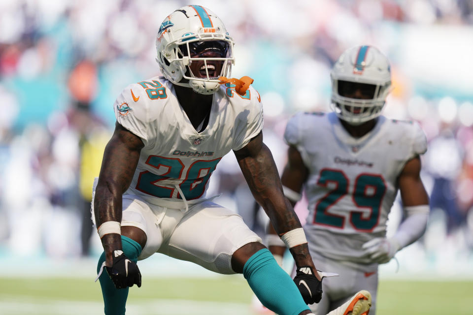 Miami Dolphins cornerback Kader Kohou (28) celebrates a play during the second half of an NFL football game against the New England Patriots, Sunday, Sept. 11, 2022, in Miami Gardens, Fla. (AP Photo/Rebecca Blackwell)