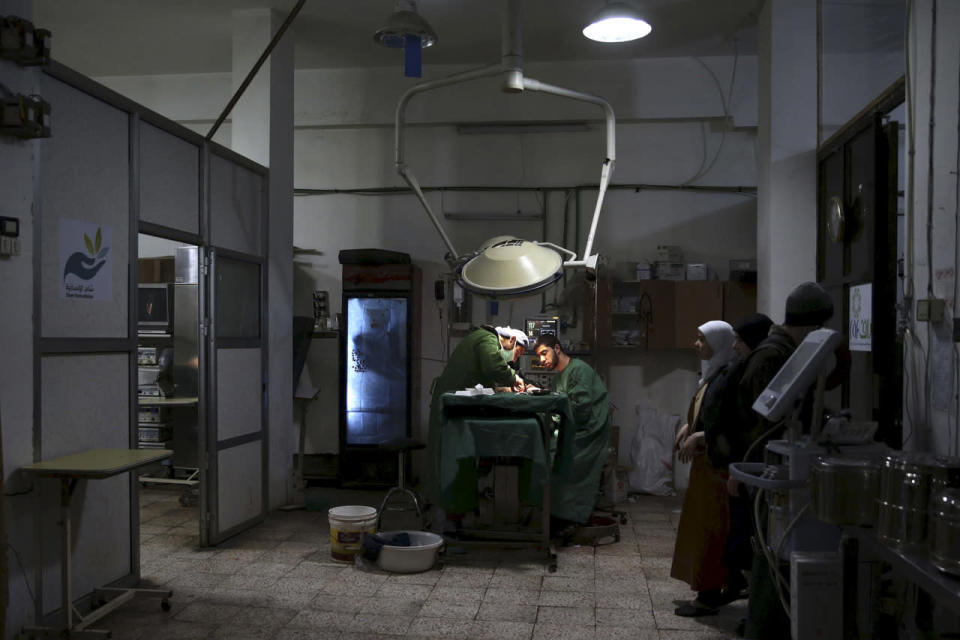 Doctors treat an injured civilian 