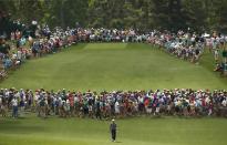 Jordan Spieth of the U.S. walks up the eighth fairway during second round play of the Masters golf tournament at the Augusta National Golf Course in Augusta, Georgia April 10, 2015. REUTERS/Mark Blinch