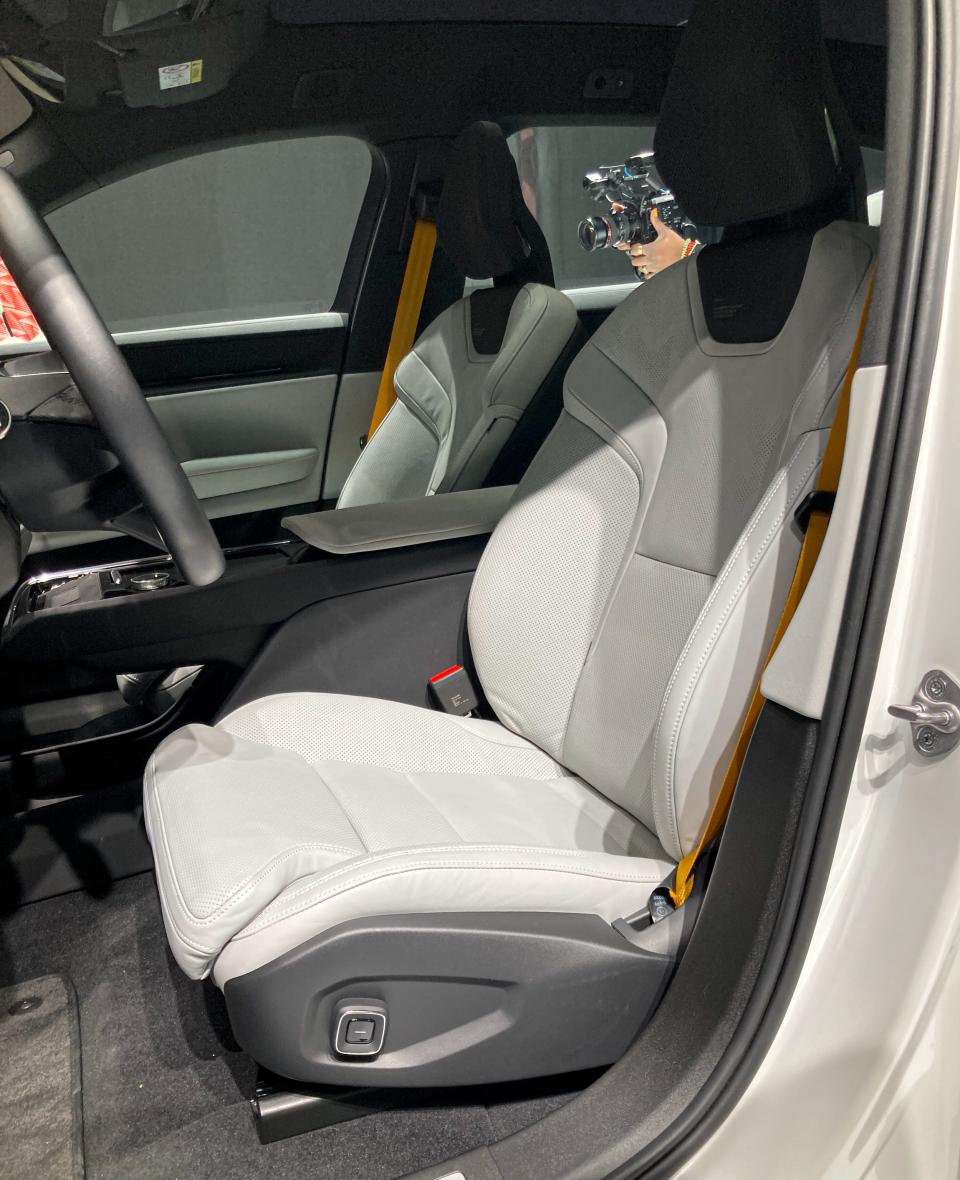 The front seats of the Polestar 3 electric SUV, as viewed from outside the driver's door.