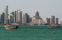 FILE PHOTO: Buildings are seen on a coast line in Doha, Qatar June 5, 2017. REUTERS/Naseem Zeitoon/File Photo