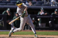 Oakland Athletics' Zack Gelof hits a two-run home run during the ninth inning of the baseball game against the New York Yankees at Yankee Stadium Monday, April 22, 2024, in New York. (AP Photo/Seth Wenig)