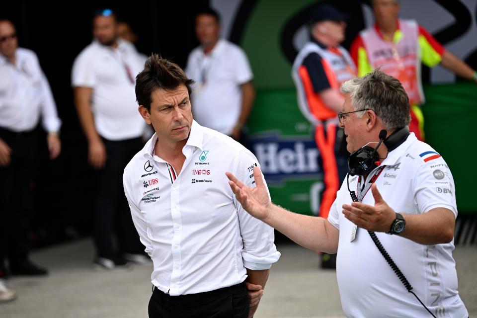 Mercedes-AMG team principal Toto Wolff talks with Alpine team principal Otmar Szafnauer, right, before the Formula One Dutch Grand Prix auto race, at the Zandvoort racetrack, in Zandvoort, Netherlands, Sunday, Sept. 4, 2022. (Christian Bruna/Pool via AP)