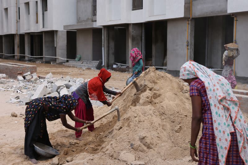 FILE PHOTO: Heena Parmar works at a construction site in Ahmedabad