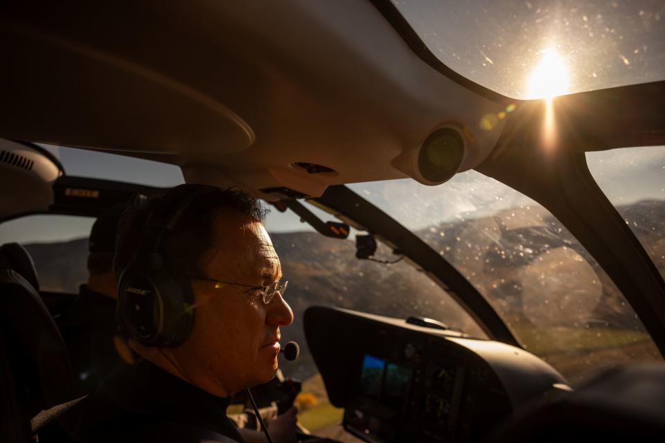 Brandon Fugal, owner of Skinwalker Ranch, is pictured in his helicopter while his brother, Cameron Fugal, flies them away from the ranch in rural Uintah County after a visit on Thursday, Oct. 5, 2023. | Spenser Heaps, Deseret News