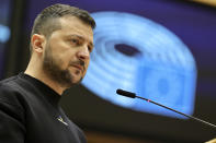 Ukraine's President Volodymyr Zelenskyy speaks during an EU summit at the European Parliament in Brussels, Belgium, Thursday, Feb. 9, 2023. On Thursday, Zelenskyy will join EU leaders at a summit in Brussels, which German Chancellor Olaf Scholz described as a "signal of European solidarity and community." (AP Photo/Olivier Matthys)