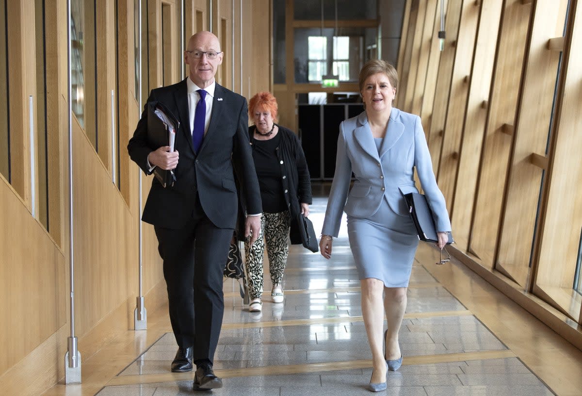 First Minister Nicola Sturgeon (right) on her way to the Chamber to deliver a statement to MSPs in the Scottish Parliament, Edinburgh, on her plans to hold a second referendum on Scottish independence on October 19, 2023. (Lesley Martin/PA) (PA Wire)