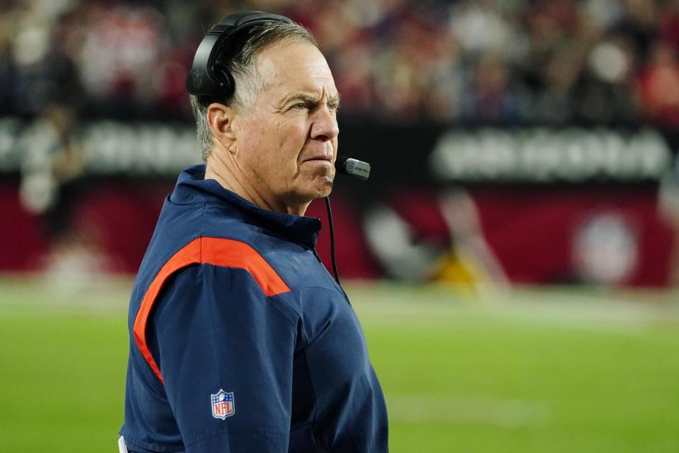 New England Patriots head coach Bill Belichick watches during the first half of an NFL football game against the Arizona Cardinals, Monday, Dec. 12, 2022, in Glendale, Ariz. (AP Photo/Darryl Webb)