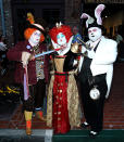 <p>Cosplayers dressed as Mad Hatter, Red Queen, and White Rabbit at Comic-Con International on July 20, 2018, in San Diego. (Photo: Phillip Faraone/Getty Images) </p>