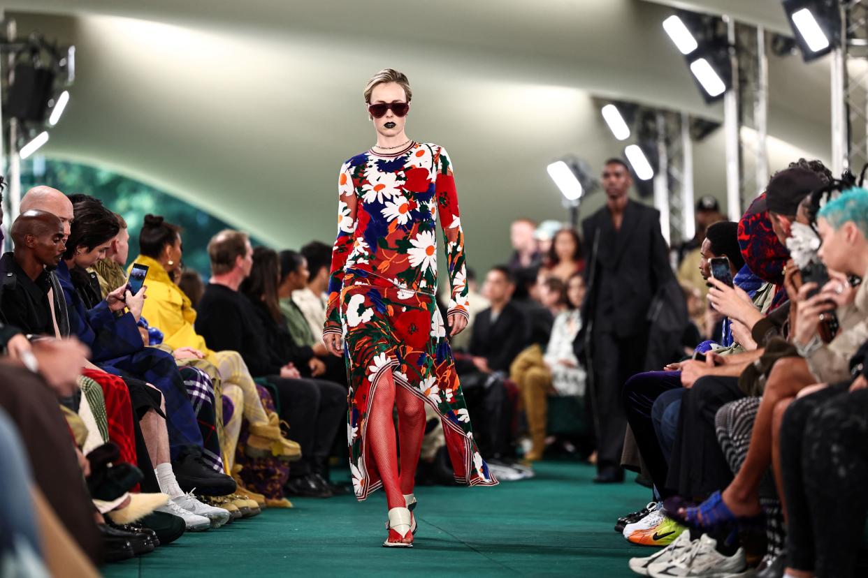 A model presents a creation during a catwalk presentation for British fashion house Burberry's Spring/Summer 2024 collection, at London Fashion Week in London.