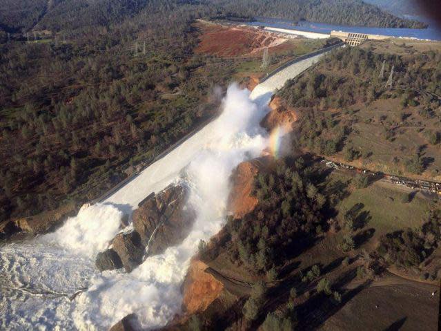 The damaged spillway with eroded hillside at the Oroville Dam in Oroville, California, earlier in the week. The water has now stabilised: Reuters