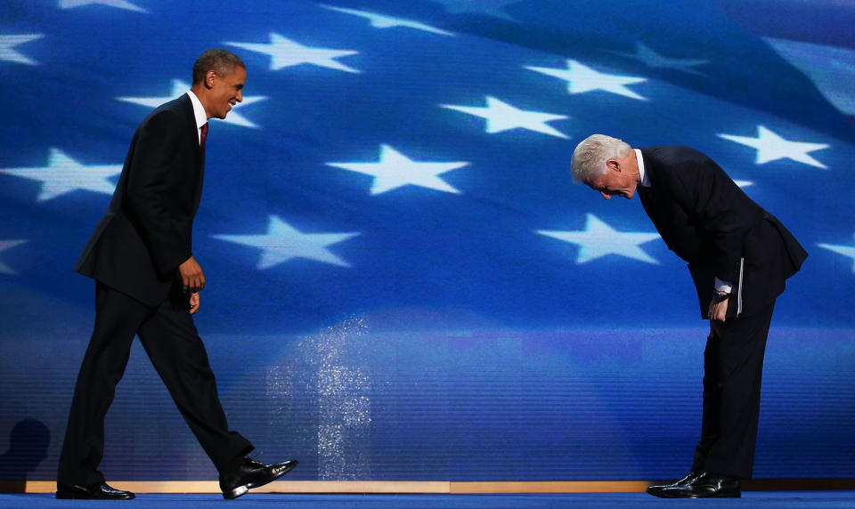 <p>Former President Bill Clinton greets Democratic presidential candidate, President Barack Obama (L) on stage during day two of the Democratic National Convention at Time Warner Cable Arena on September 5, 2012 in Charlotte, North Carolina. The DNC that will run through September 7, will nominate U.S. President Barack Obama as the Democratic presidential candidate. (Chip Somodevilla/Getty Images) </p>