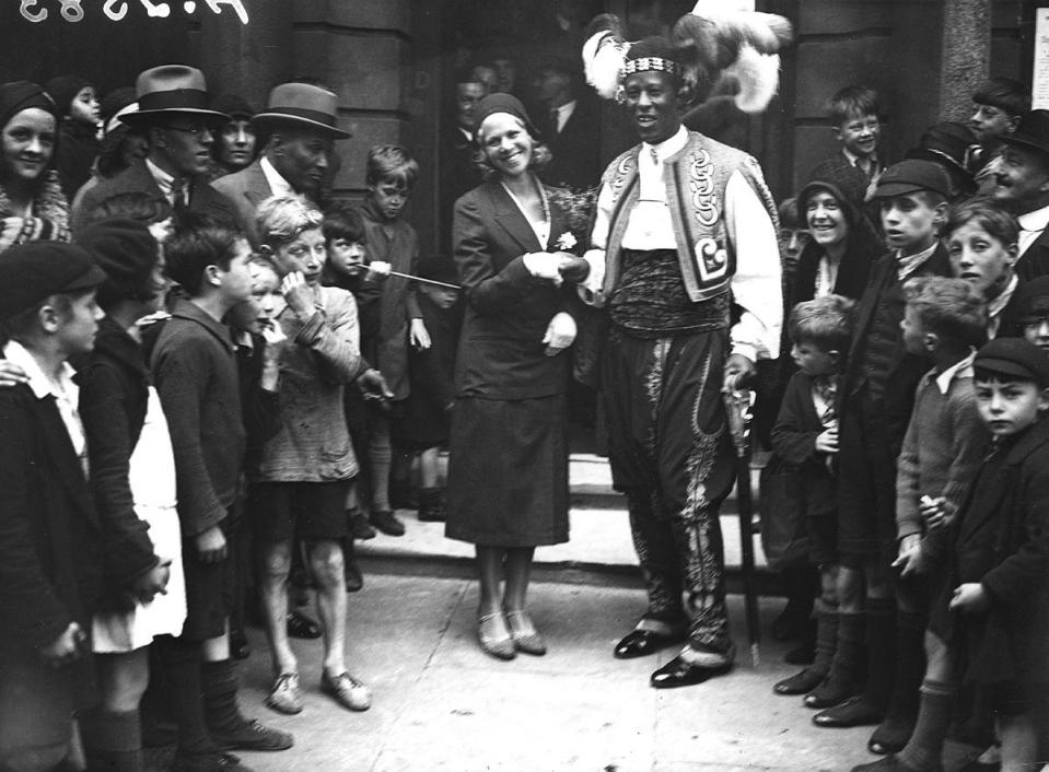 George Woodbine, for Daily Herald, The wedding of Nellie Adkins and Ras Prince Monolulu (Peter Carl MacKay), 21 August, 1931, modern bromide print from original negative, 140 x 192 mm. National Portrait Gallery, London. Given by Sidney Buckland, 2001. © Science & Society Picture Library / National Portrait Gallery, London