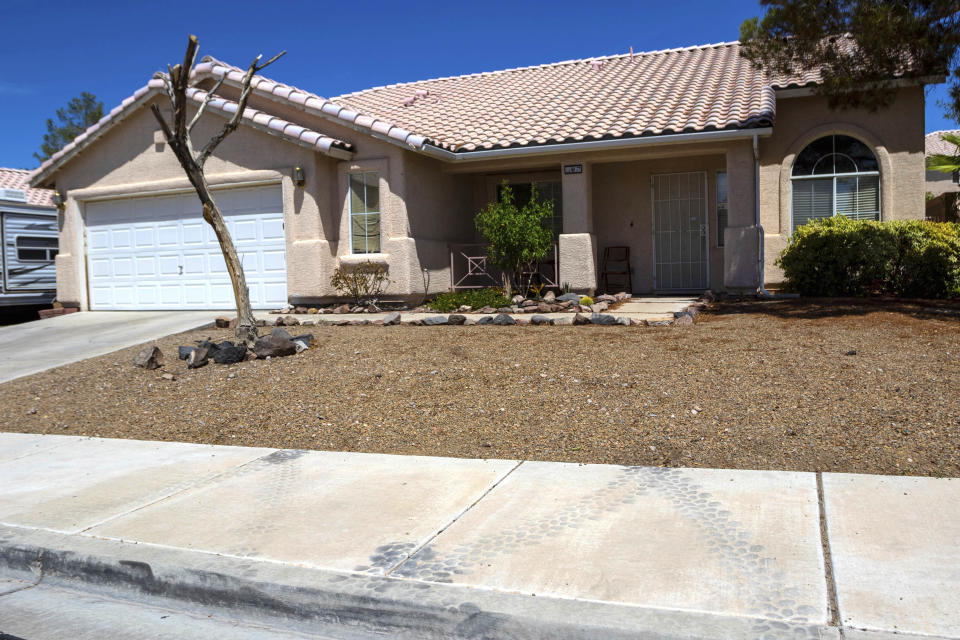 A home searched by Las Vegas police is seen on Thursday, July 20, 2023, in neighboring Henderson, Nev. The property was searched Monday, July 17, in connection with the 1996 drive-by shooting of rapper Tupac Shakur in Las Vegas. (AP Photo/Ty ONeil)