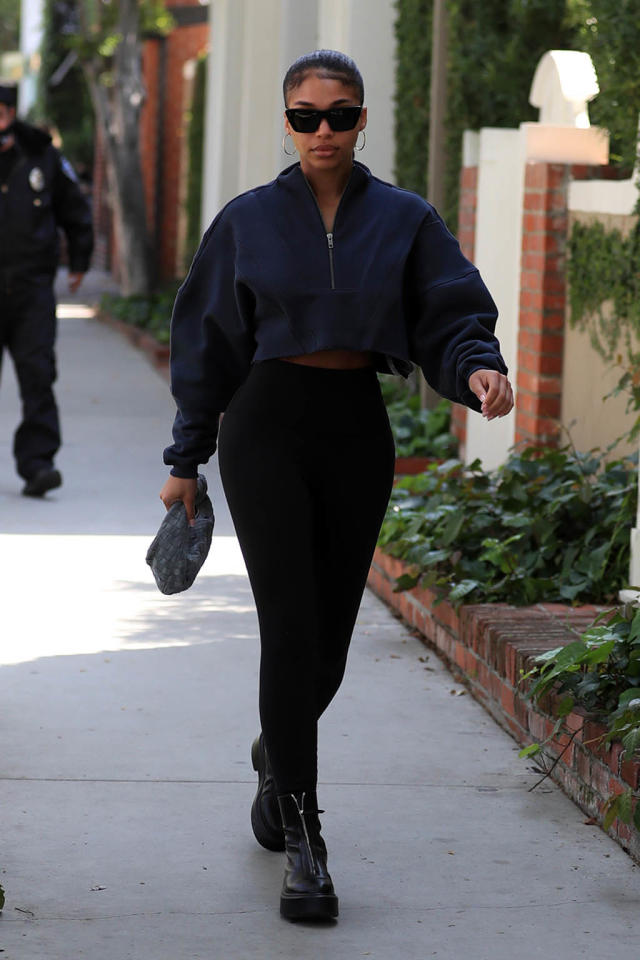 Lori Harvey is Sporty-Cute in a Cropped Puffer and Chanel Rainboots