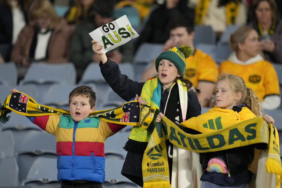 Australia fans cheer on the stands before the Women's World Cup soccer match between Australia and Ireland at Stadium Australia in Sydney, Australia, Thursday, July 20, 2023. (AP Photo/Mark Baker)