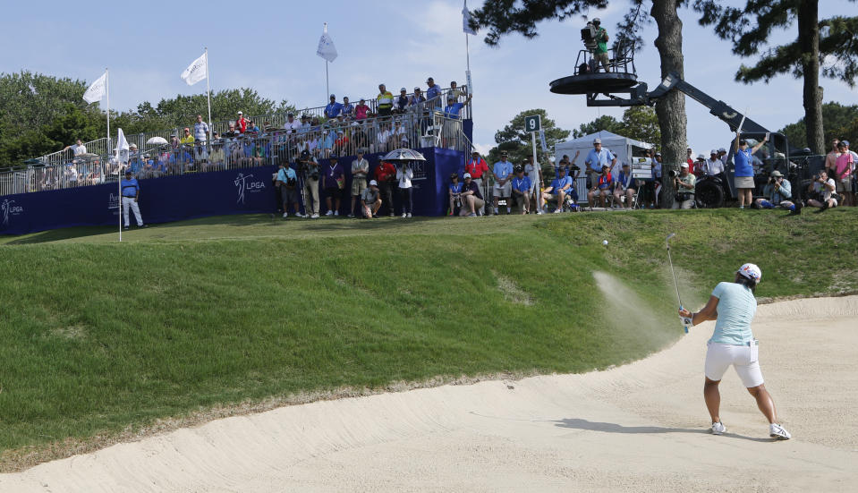 Nasa Hataoka, of Japan, hits out of the bunker on the ninth hole during the final round of the Pure Silk Championship golf tournament at Kingsmill Resort, in Williamsburg, Va., Sunday, May 26, 2019. (AP Photo/Steve Helber)