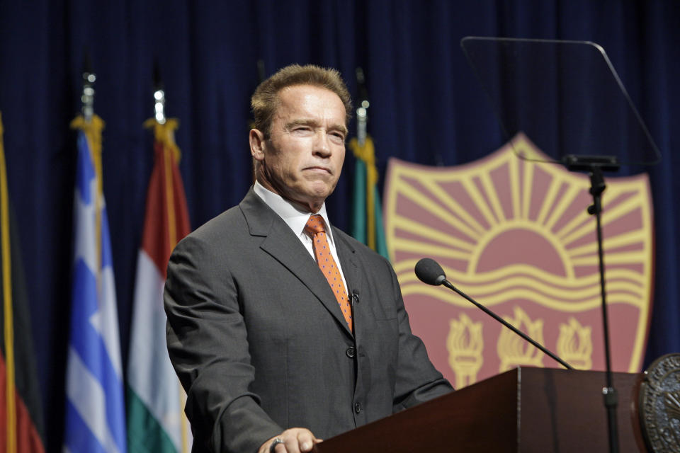 Former California Gov. Arnold Schwarzenegger delivers the keynote address at the inaugural symposium sponsored by the Schwarzenegger Institute for State and Global Policy, at the University of Southern California in Los Angeles Monday, Sept. 24, 2012. (AP Photo/Reed Saxon)
