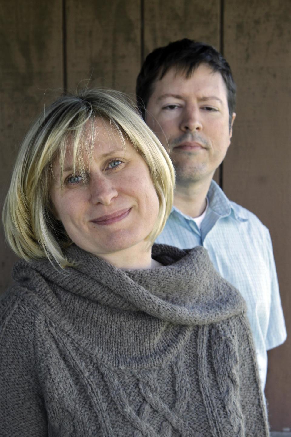 In this April 24, 2012 photo, Sarah and Devin Stang stand on the porch of the home they are renting in LaGrange, Ohio. The Stangs filed for bankruptcy and lost their Sandusky, Ohio home to foreclosure, but due to a 2005 law their student loan debts are still not dischargeable. (AP Photo/Mark Duncan)