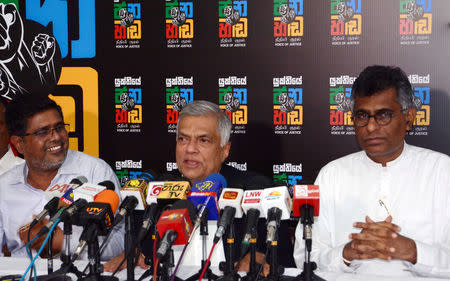 Sri Lanka's deposed Prime Minister Ranil Wickremesinghe speaks to media after Supreme Court suspended a presidential decree to dissolve parliament and hold fresh elections, during a news conference in Colombo, Sri Lanka November 13, 2018. REUTERS/Stringer