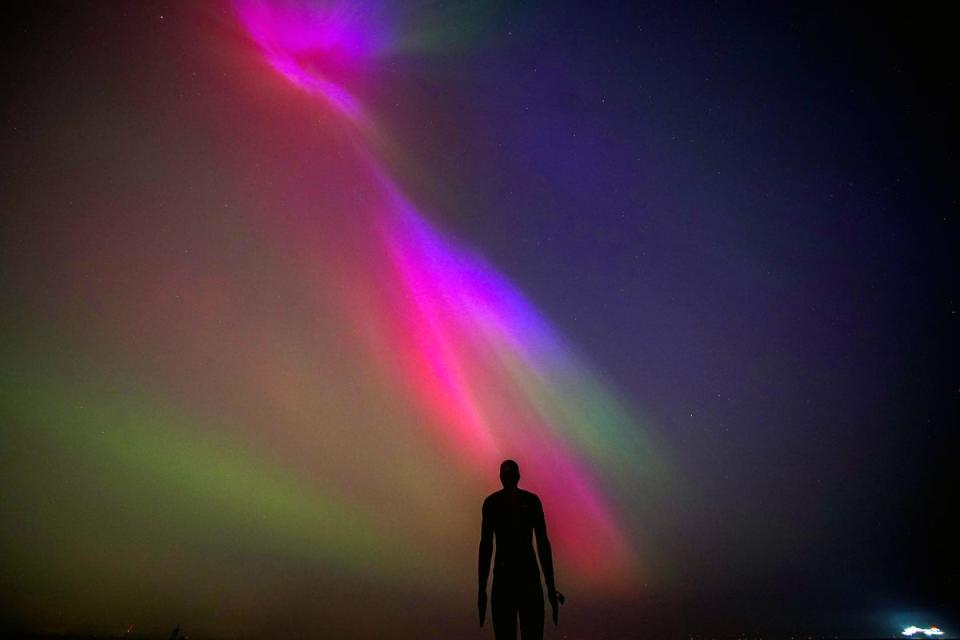 The Northern Lights, glowed on the horizon at Another Place by Anthony Gormley, Crosby Beach, Liverpool last week (Peter Byrne/PA) (PA Wire)