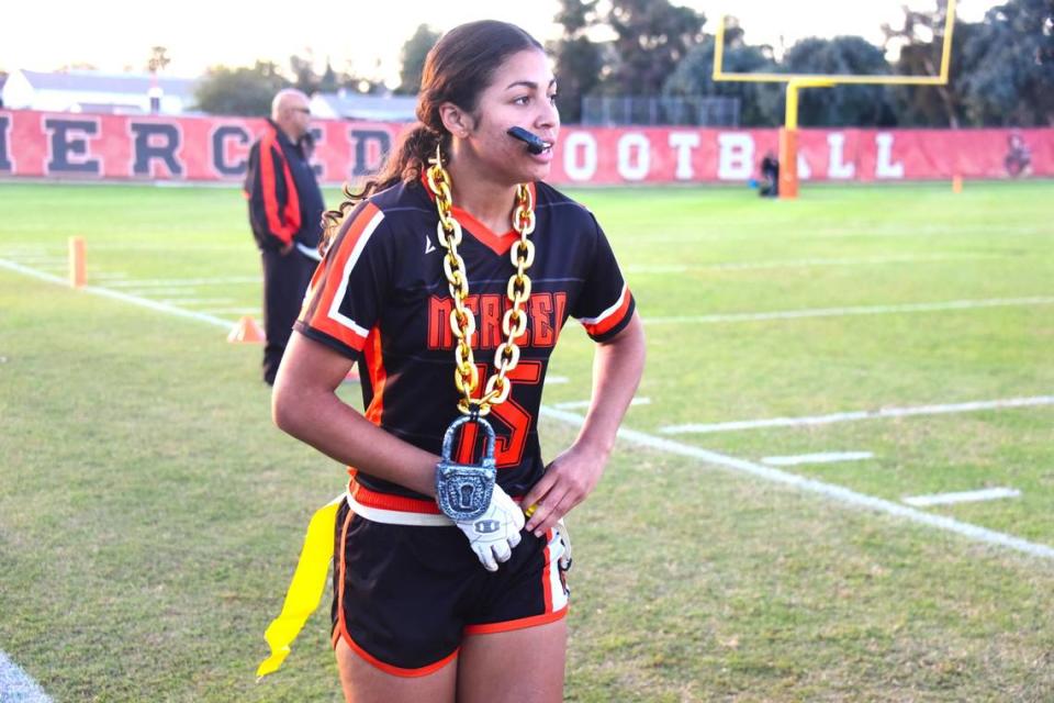 Merced High School senior safety Taquisha Thames wears the Bears’ turnover chain on the sideline after coming up with a key interception during Merced’s 24-6 playoff win on Thursday, Oct. 26, 2023.