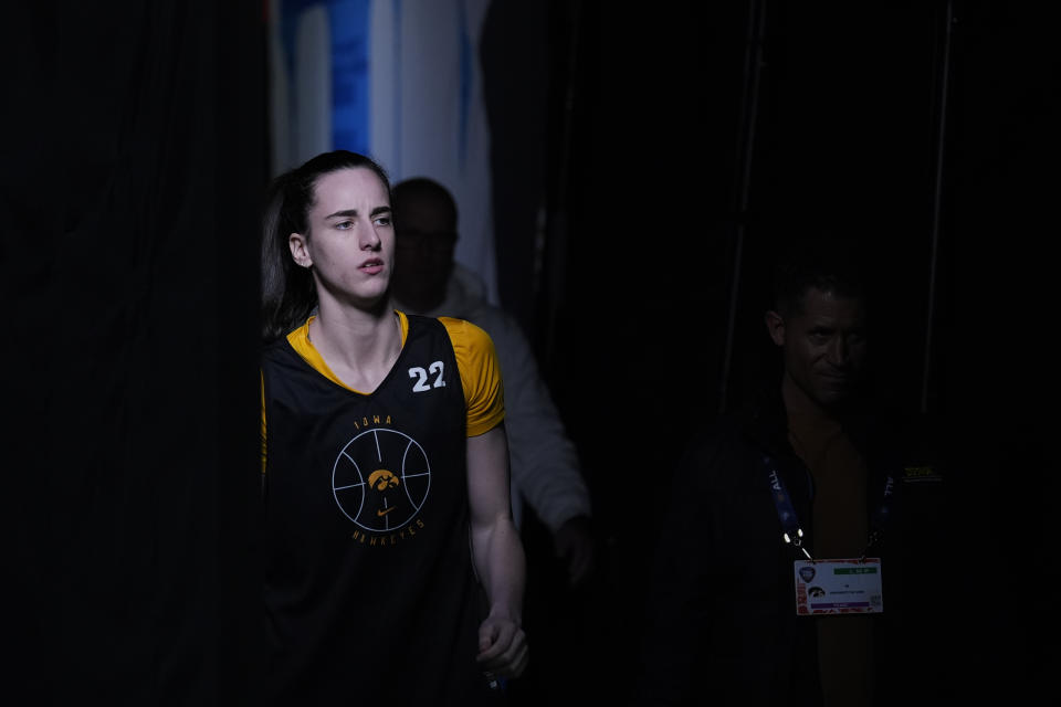 Iowa's Caitlin Clark walks on the court during a practice for an NCAA Women's Final Four semifinals basketball game Thursday, April 4, 2024, in Cleveland. (AP Photo/Carolyn Kaster)