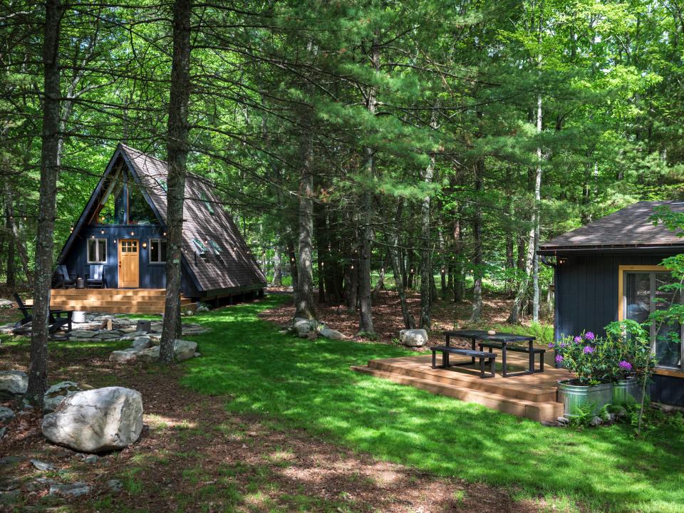 There are two buildings within the property, the A-frame cabin and the chalet.