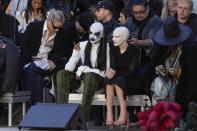 Guests await the Rick Owens ready-to-wear Spring/Summer 2023 fashion collection presented Thursday, Sept. 29, 2022 in Paris. (AP Photo/Francois Mori)