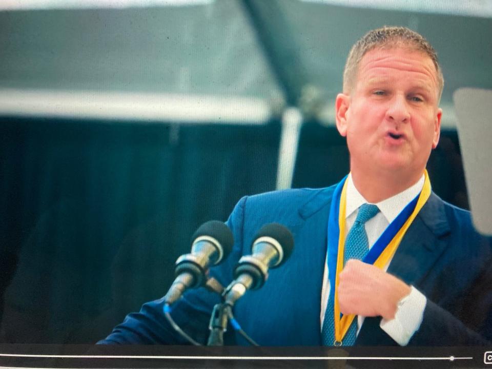 Philanthropist Robert Hale tells University of Massachusetts Dartmouth Class of 2024 graduates about the gift of $1,000 he and his wife Karen gave to them in the form of two envelopes: one to use, one to share.