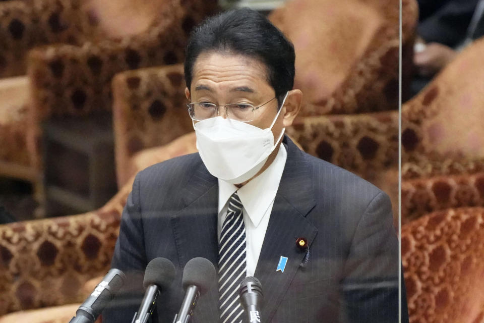 FILE - Japan's Prime Minister Fumio Kishida speaks on former Prime Minister Shinzo Abe's funeral at the Council of the House of Representatives in Tokyo on Sept. 8, 2022. A rare state funeral Tuesday, Sept. 27 for the former prime minister who was assassinated in July, has split Japan. (Kyodo News via AP, File)