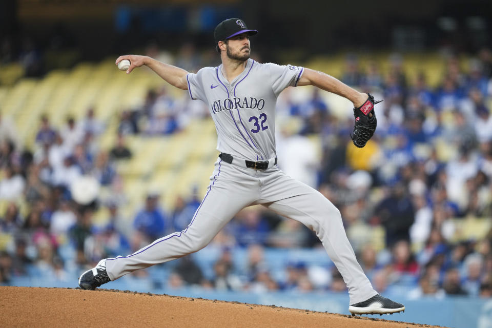 Colorado Rockies starting pitcher Dakota Hudson (32) throws during the first inning of a baseball game against the Los Angeles Dodgers in Los Angeles, Friday, May 31, 2024. (AP Photo/Ashley Landis)