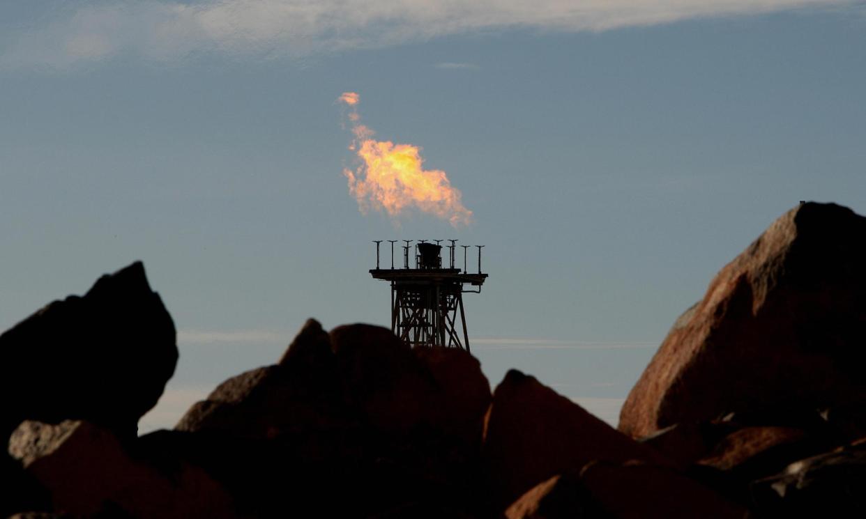 <span>A gas flare at a Woodside North West shelf project. The WA government wants ‘a secure supply of gas as firming fuel in our system’.</span><span>Photograph: Greg Wood/AFP/Getty Images</span>