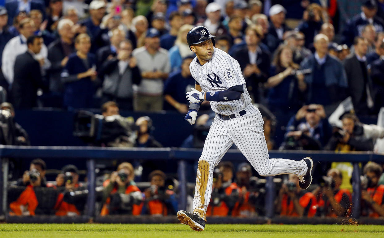 Image: Derek Jeter runs home to score a run during his last game at Yankee Stadium on September 25, 2014 in New York City. (Jim McIsaac / Getty Images)