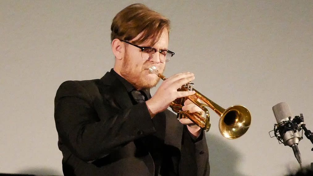  A music student with a trumpet uses MXL mics at the Osceola County School for the Arts’. 